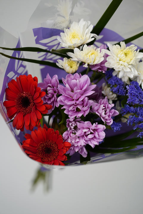 12-Stem Mixed Bouquet (Purple & Red Wrap)